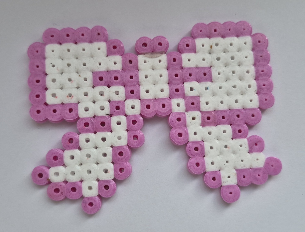 Original pink and white bead bow with two trailing ribbons