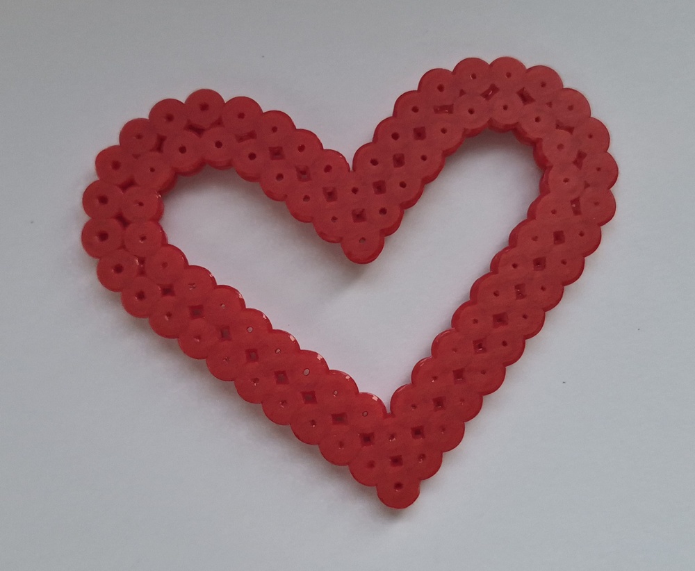 Original red outline heart made from beads